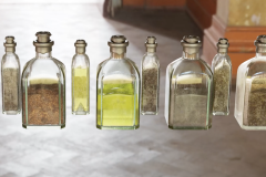 Alchemy bottles back - Joshua Drumm